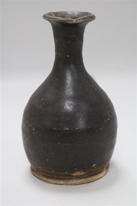 A Chinese brown glazed bottle vase, Song dynasty 6.5in.